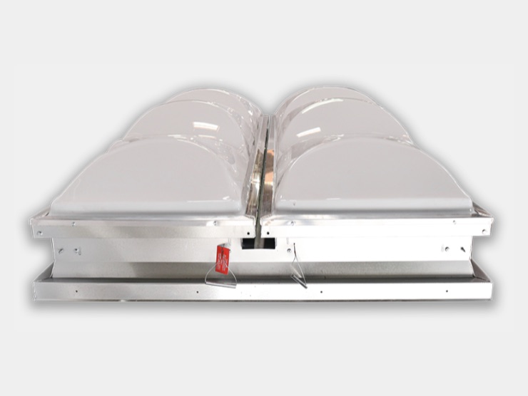 UL-listed two-door smoke vent skylight, shown with its fusible-link release and spring-assisted opening hardware